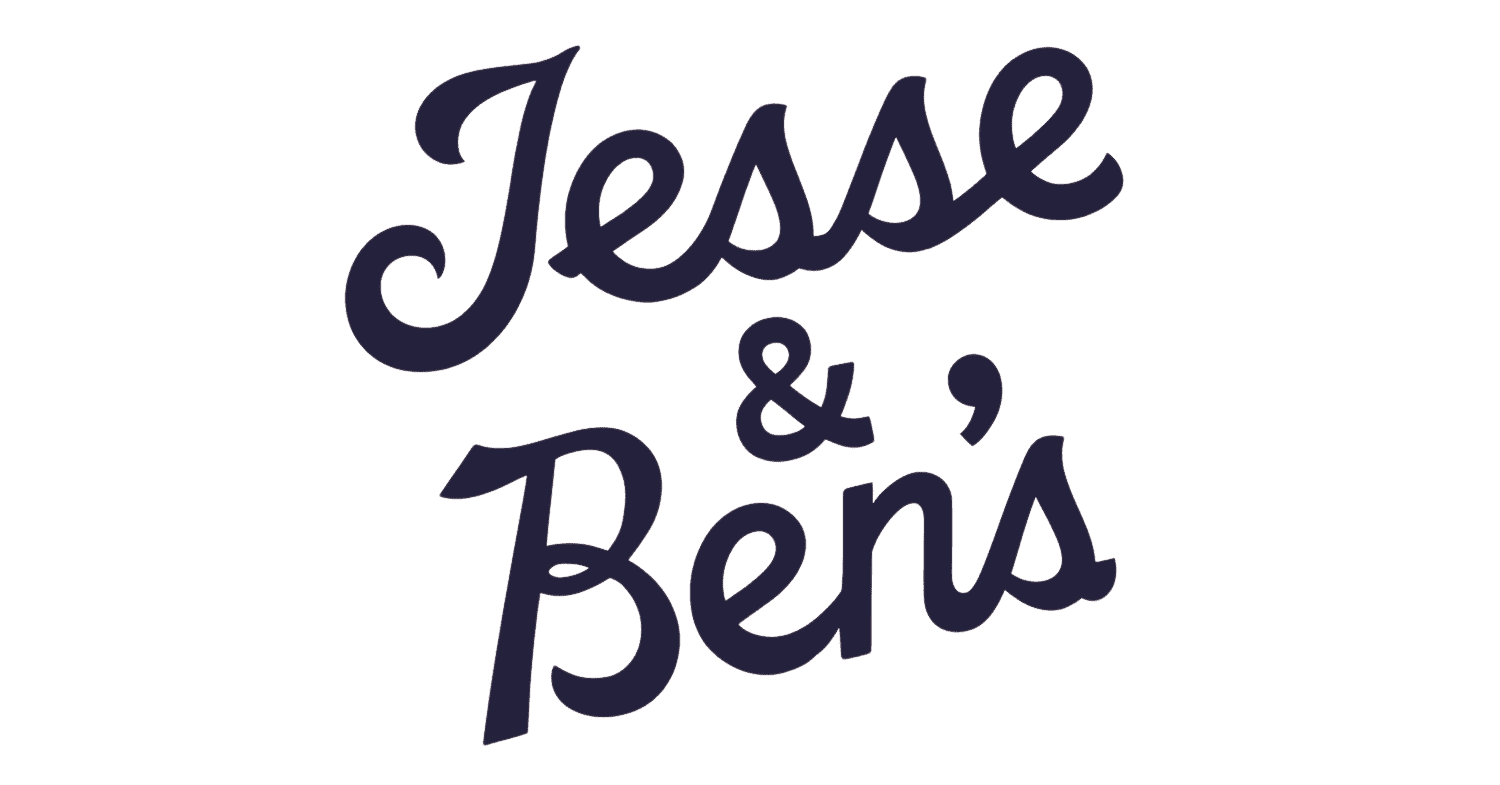 The image shows the words “Jesse & Ben’s” written in dark, bold, cursive letters on a plain, light background, elegantly showcasing both Jesse and Ben’s names in striking calligraphy.