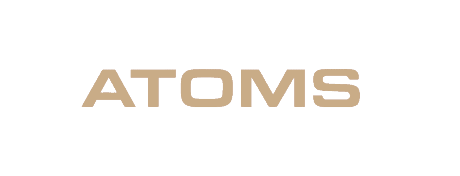 The word “ATOMS” is displayed in bold, light brown capital letters on a plain light gray background.